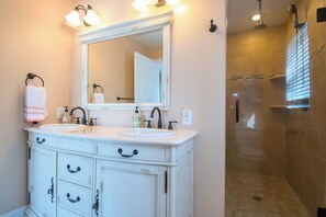 Combined shower/tub, hair dryer, towels, soap