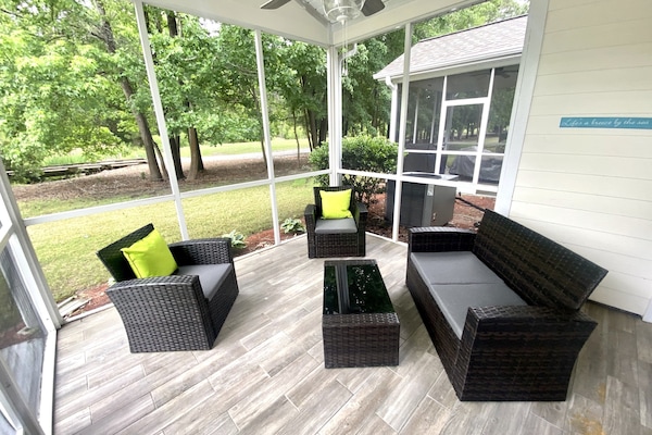 New conversation patio set on the enclosed patio overlooking the golf course