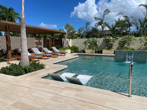 Prepare to be pampered! Golf, lagoon & ocean vista views  at Tres Palmas Villa!