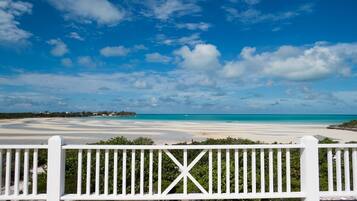 On the beach, sun loungers, beach towels
