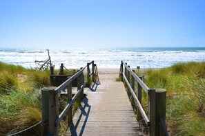 On the beach, sun loungers, beach towels
