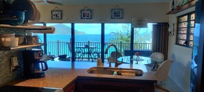 Enjoy ocean views from the kitchen window, where you can cook and dine with a scenic backdrop.