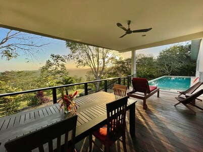 Beautiful contemporary hilltop home with impressive panoramic view and pool