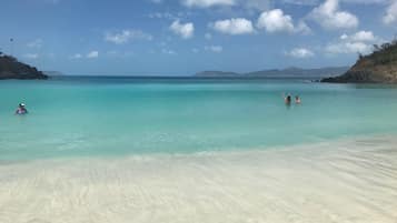 On the beach, sun loungers, beach towels