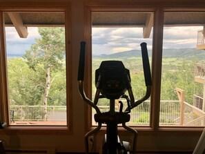 Stay active with a stationary bike in your room, offering a view of the surrounding landscape.