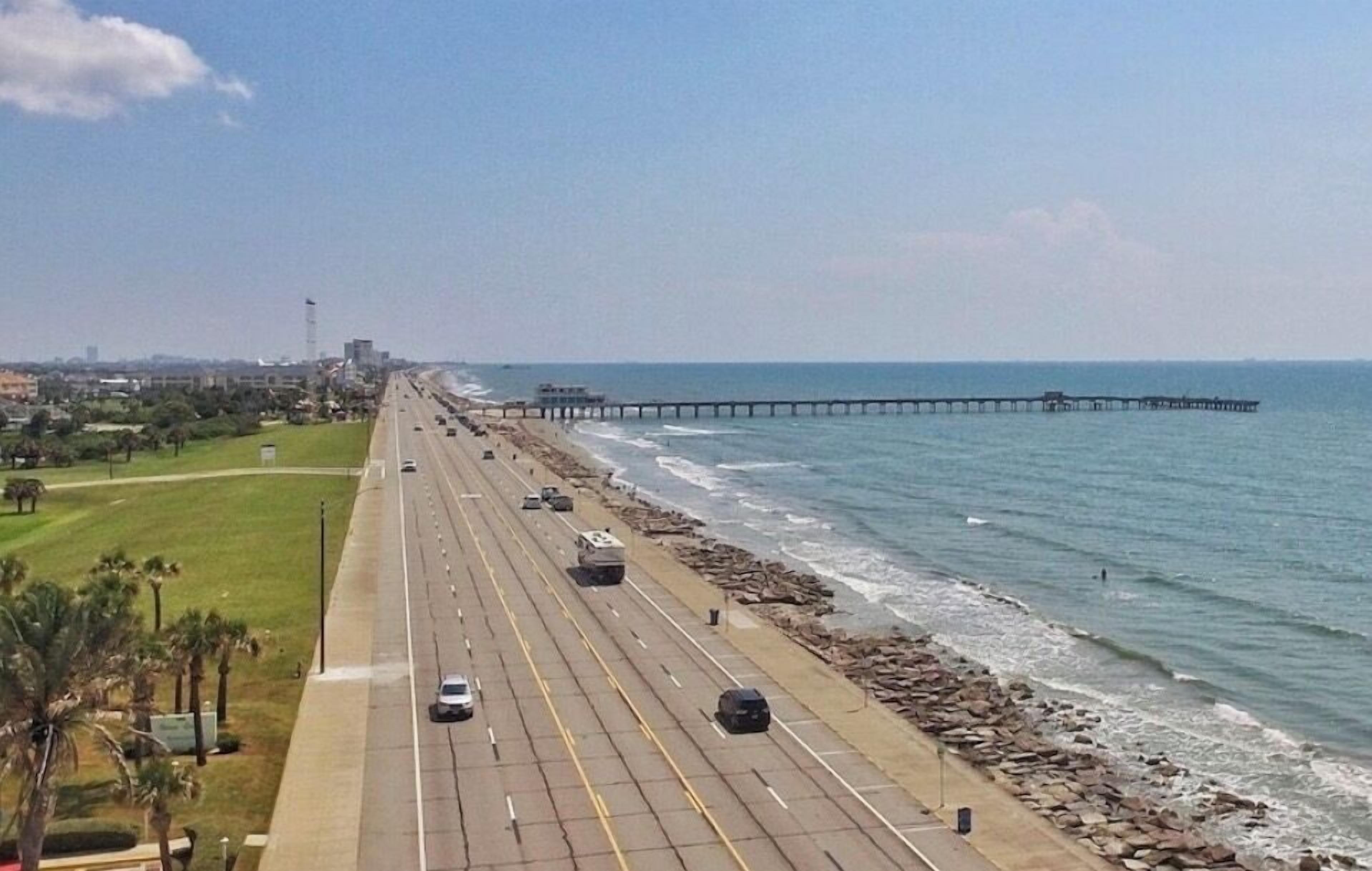 On the beach, sun-loungers