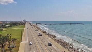On the beach, sun loungers