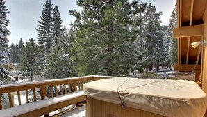 A wooden hot tub on a balcony with a view of snow-covered trees. - Family-Friendly, Pet-Friendly, Tree-Surrounded Tahoe City Vacation Home (Tahoe City)