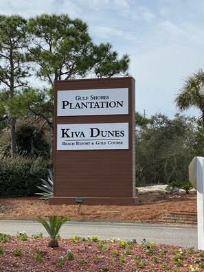 Welcome to Kiva Dunes Beach Resort & Golf Course, situated amidst lush gardens and a serene natural setting.