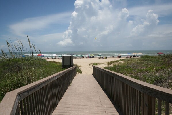 On the beach, sun loungers, beach towels