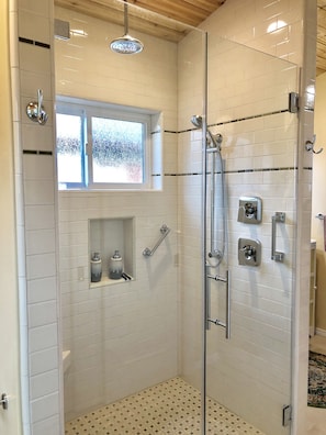Bathtub, hair dryer, towels, soap