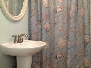 Shower, towels, soap, toilet paper