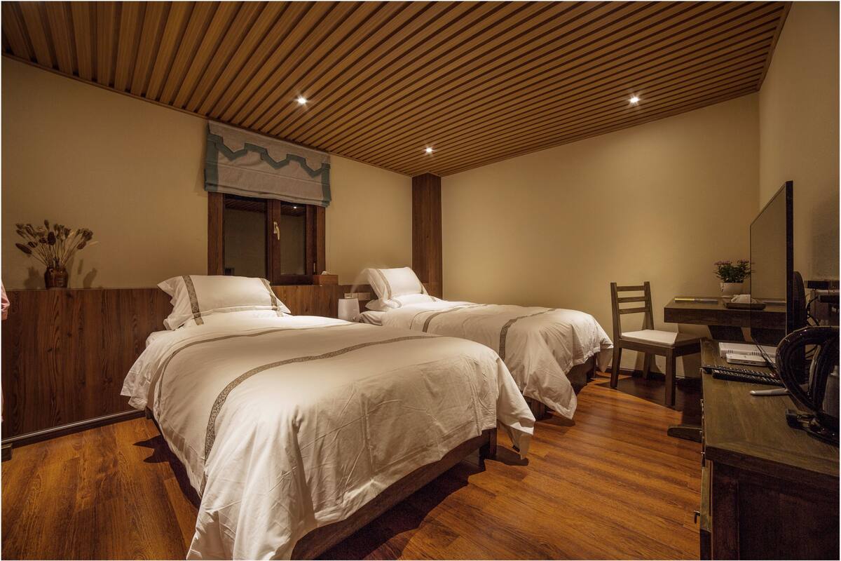 Premium bedding, down comforters, pillowtop beds, minibar