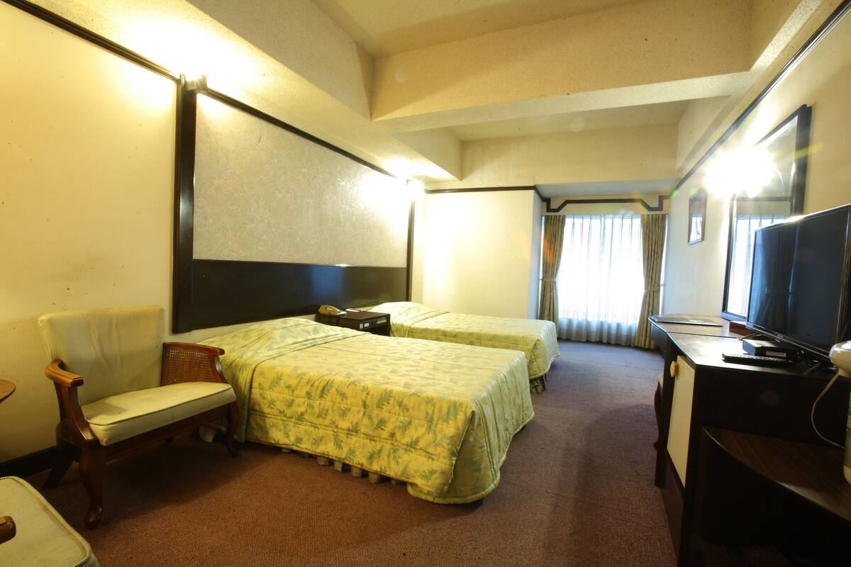 Deluxe Triple Room | Blackout curtains, free WiFi