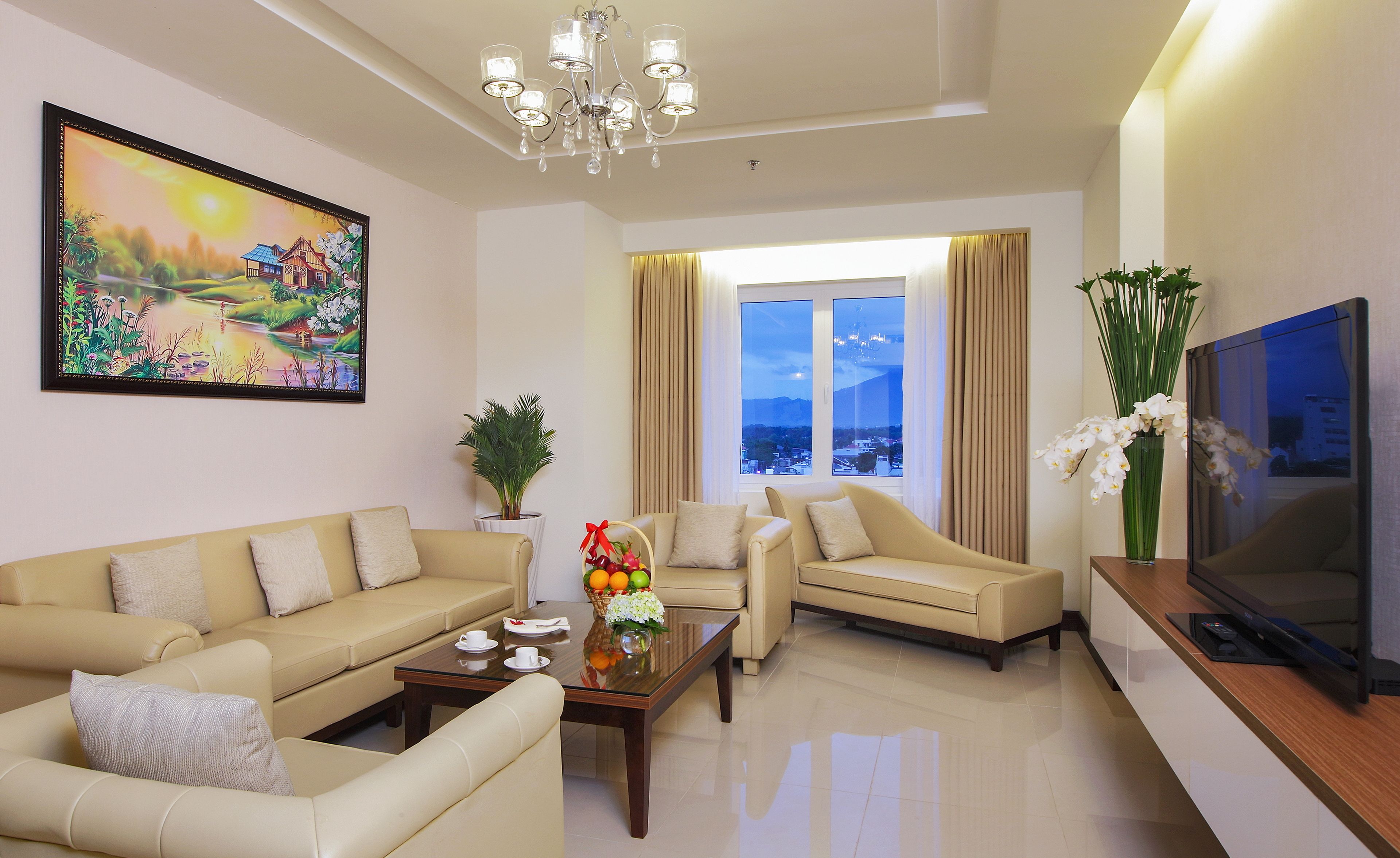 suite, city view | living room | 40-inch lcd tv with cable channels, tv