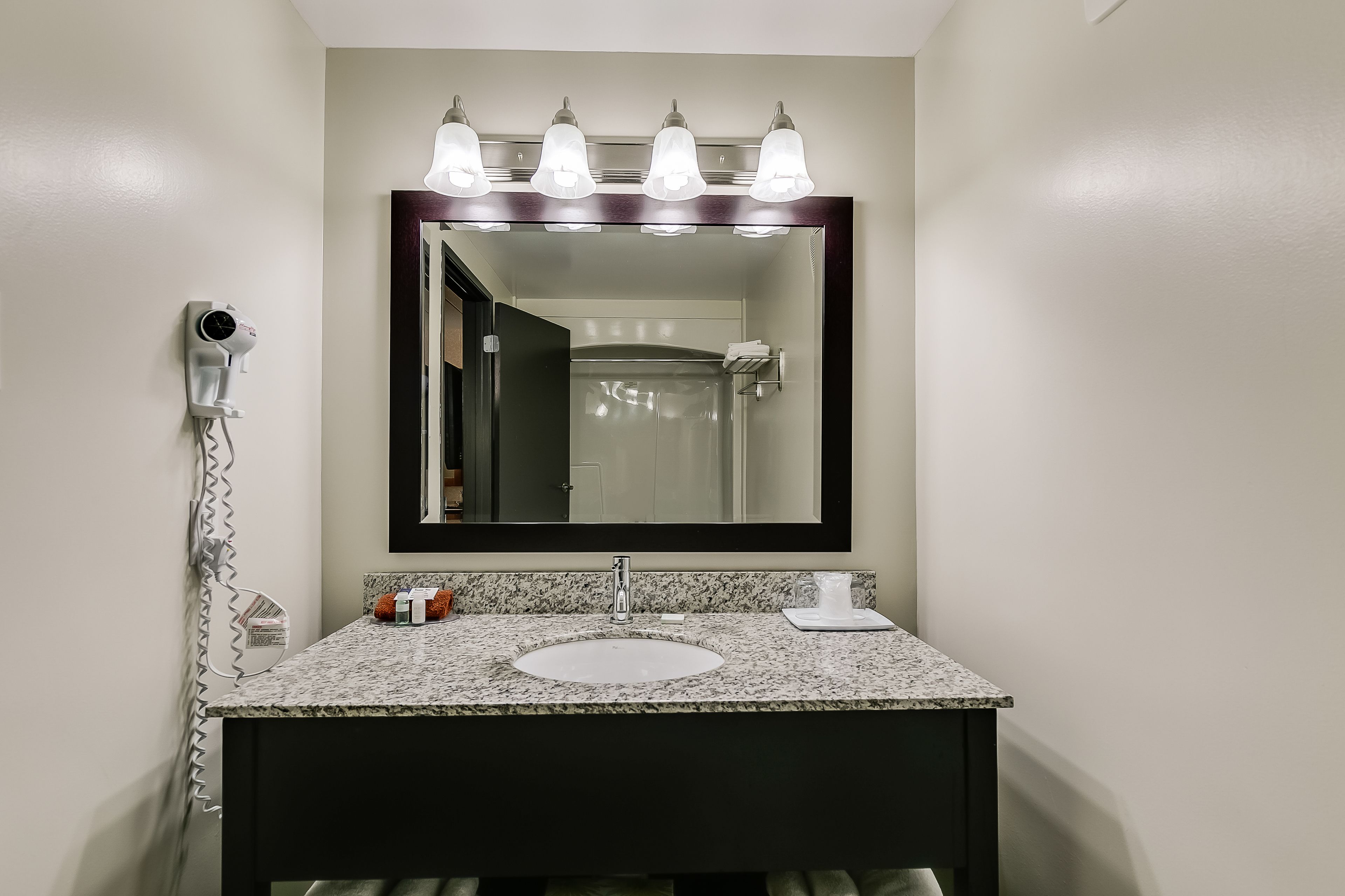 economy room, 2 queen beds (obstructed view) | bathroom sink