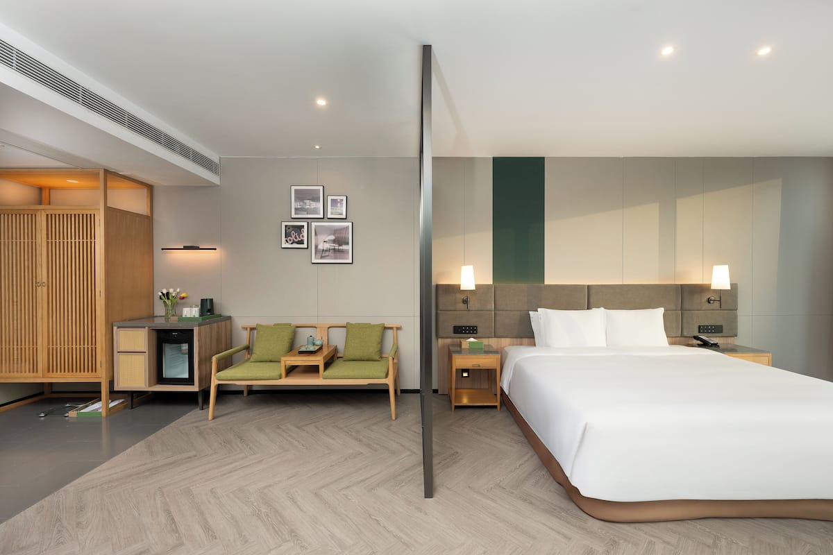 Suite, 1 King Bed | 1 bedroom, down comforters, free minibar, in-room safe