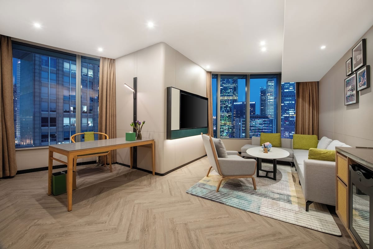 Suite, 1 Bedroom (Tower View) | Living area | 50-inch flat-screen TV with cable channels, TV, pay movies