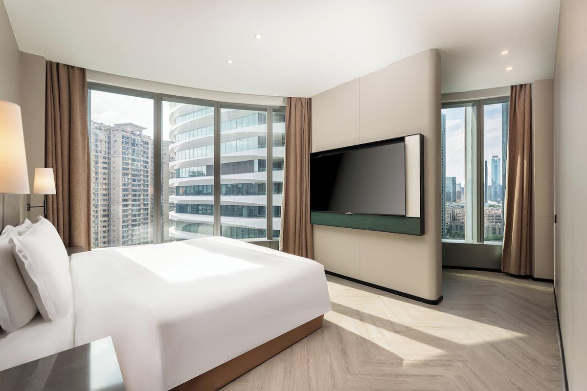 Suite, 2 Bedrooms | Down comforters, free minibar, in-room safe, desk