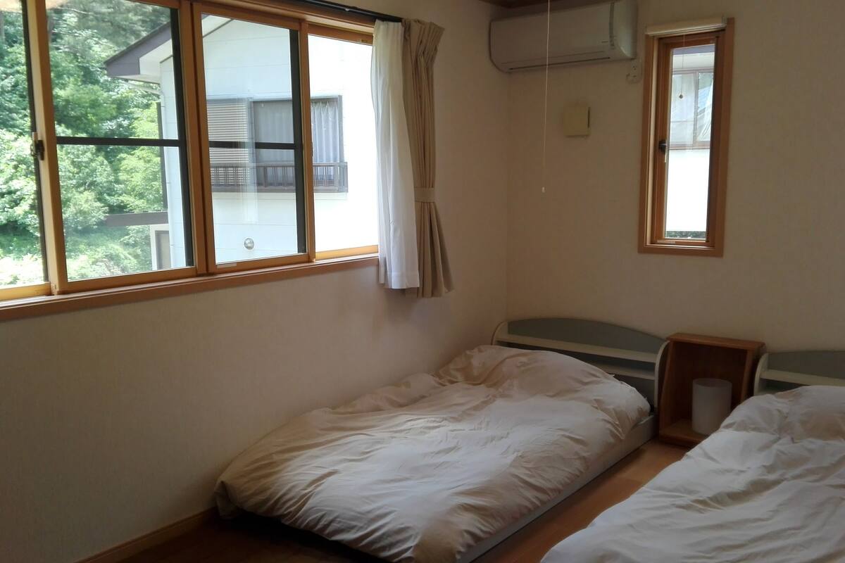 Western Style Room | Down comforters, blackout drapes, free WiFi