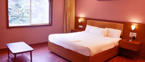 Premium Double Room, 1 Double Bed | 1 bedroom, in-room safe, desk, iron/ironing board