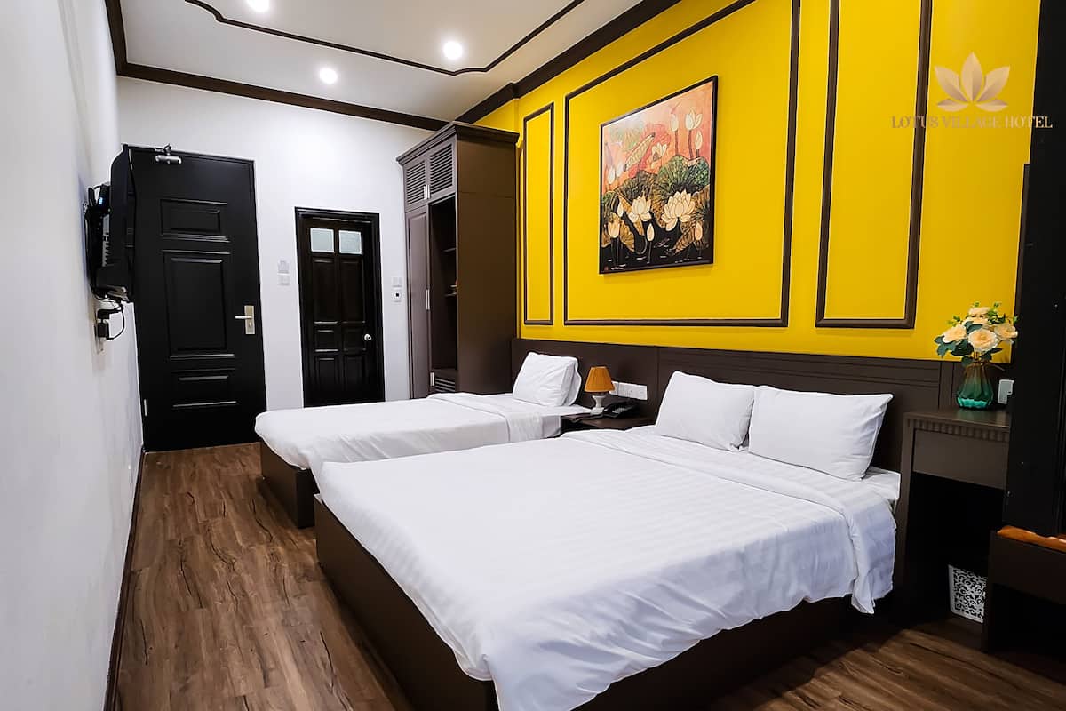 Chambre Triple Deluxe, balcon | 1 chambre, literie hypoallergénique, coffres-forts dans les chambres