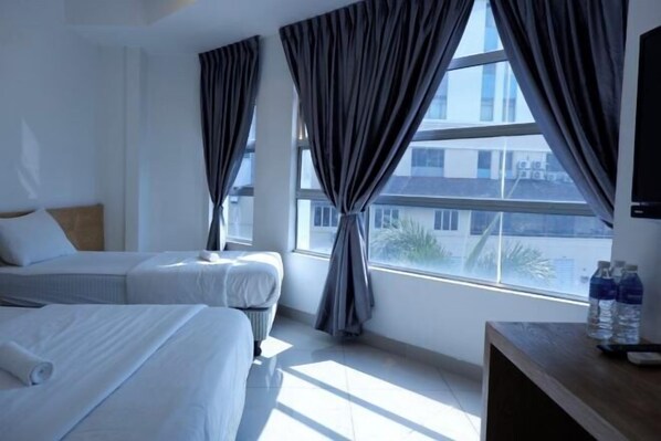 Fer et planche à repasser, Wi-Fi gratuit, draps fournis