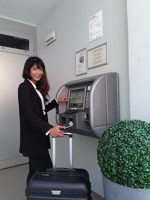 Check-in/check-out kiosk
