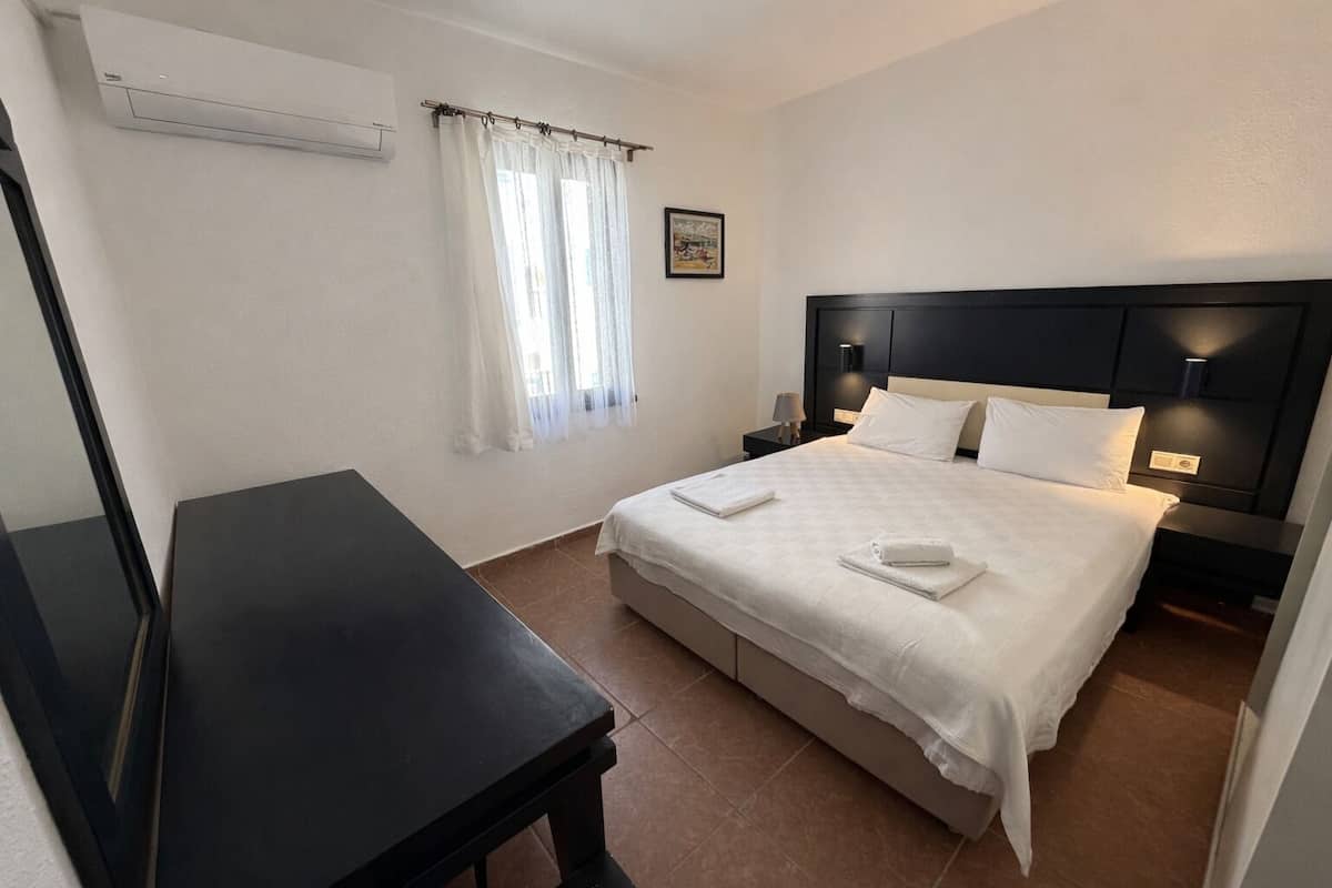 Condo Confort | Minibar, bureau, lit d’appoint (supplément), accès au Wi-Fi (inclus)