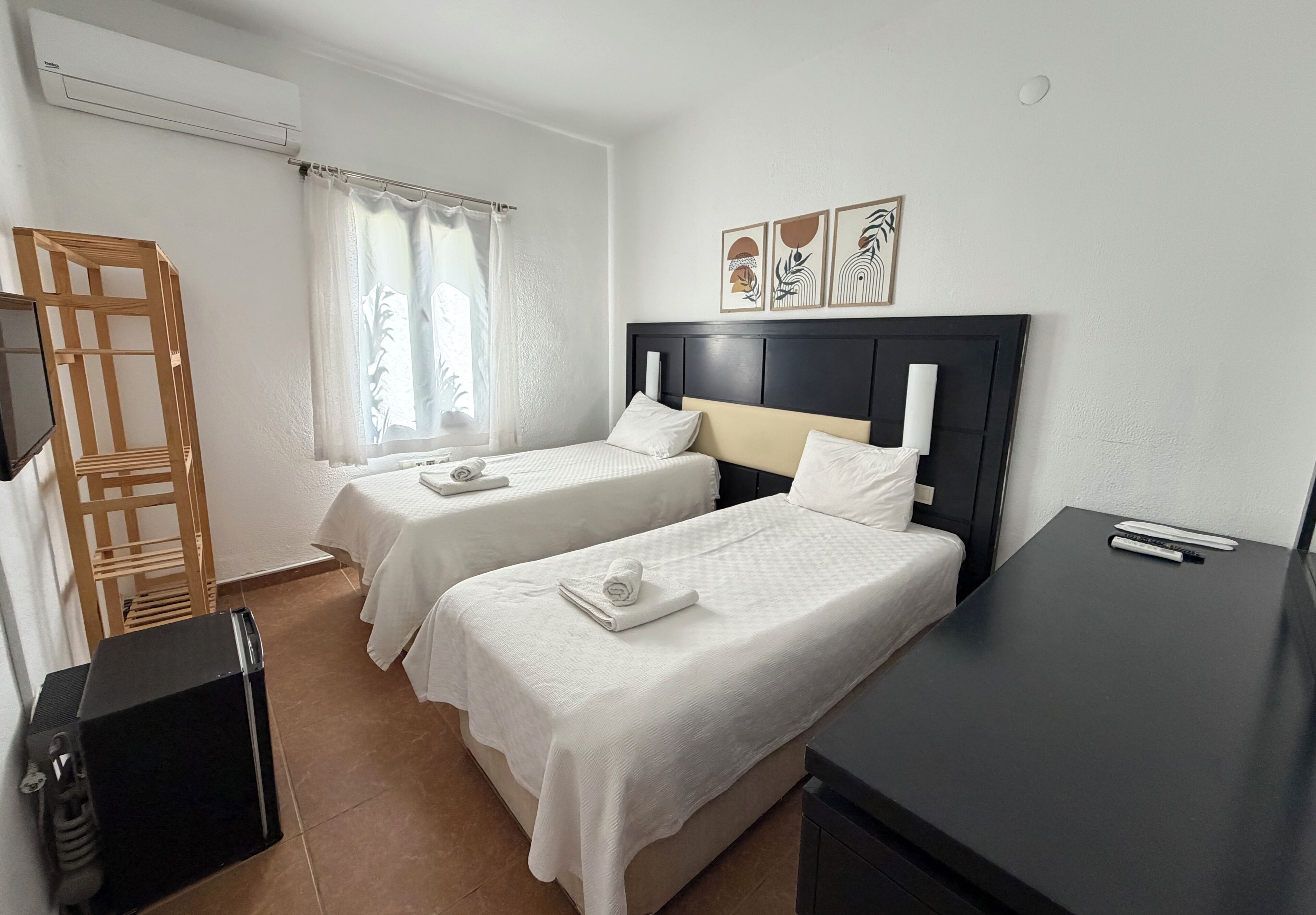 Twin Room | Minibar, desk, rollaway beds, free WiFi