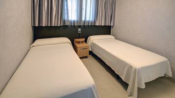 Down duvets, desk, blackout curtains, bed sheets