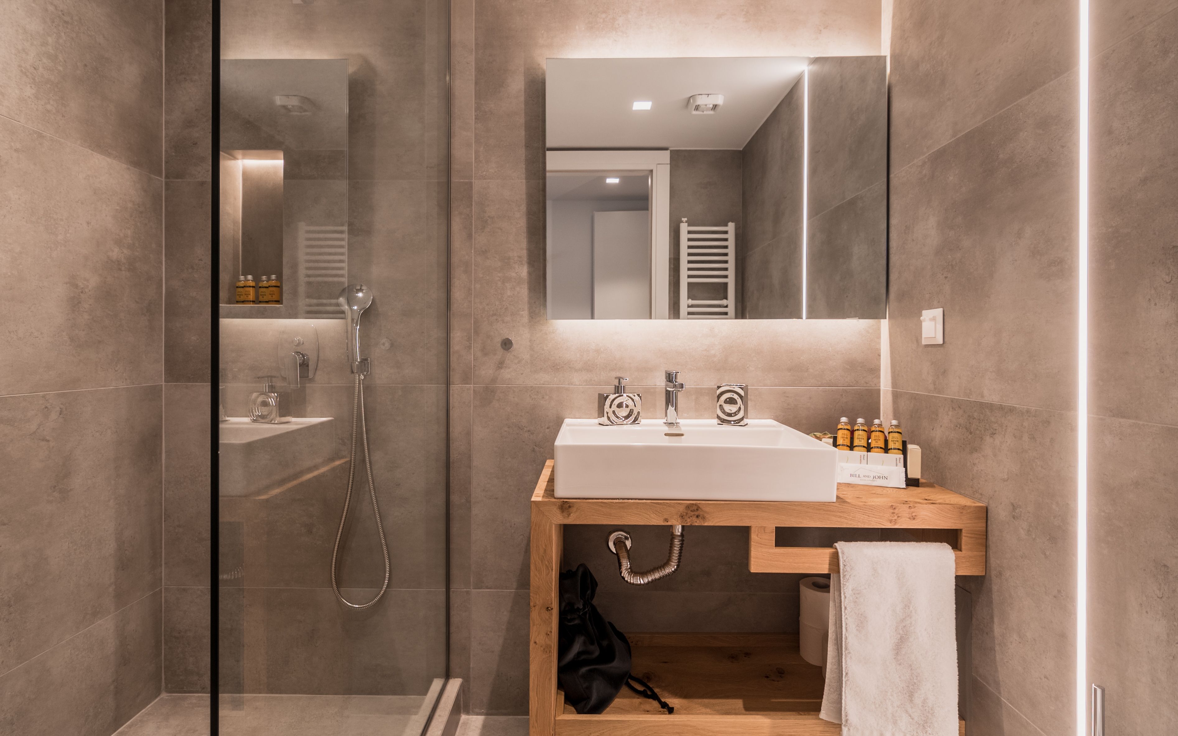 Acropolis Luxury Living | Bathroom | Shower, rainfall showerhead, free toiletries, hair dryer