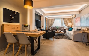 Acropolis Luxury Living | Living area | 42-inch Smart TV with cable channels, TV, Netflix