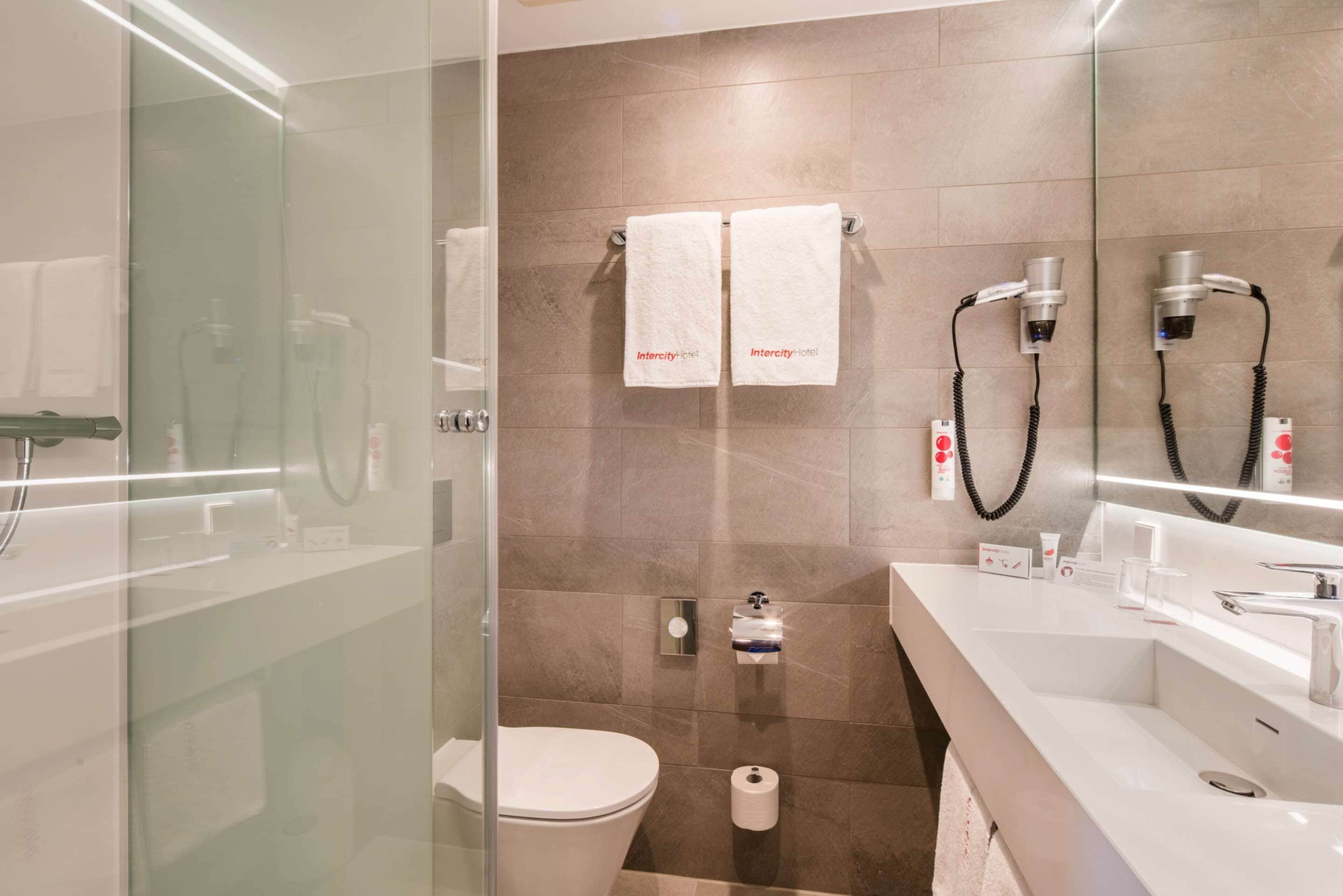 hypo-allergenic bedding, down duvets, minibar, in-room safe