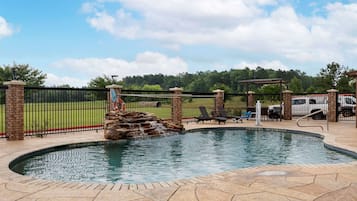 Seasonal outdoor pool, pool loungers