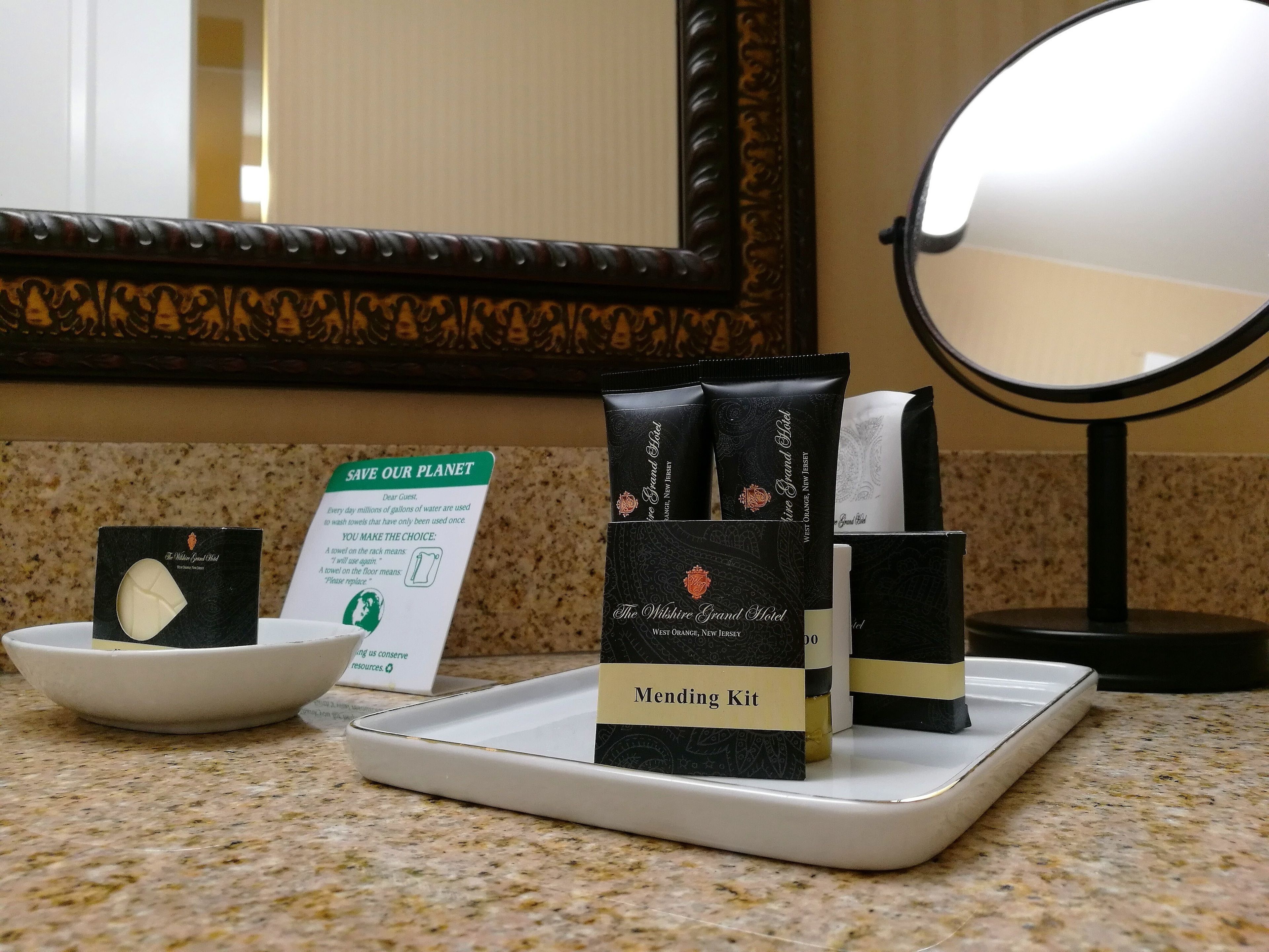 suite, 1 king bed with sofa bed | bathroom | free toiletries, hair dryer, slippers, towels