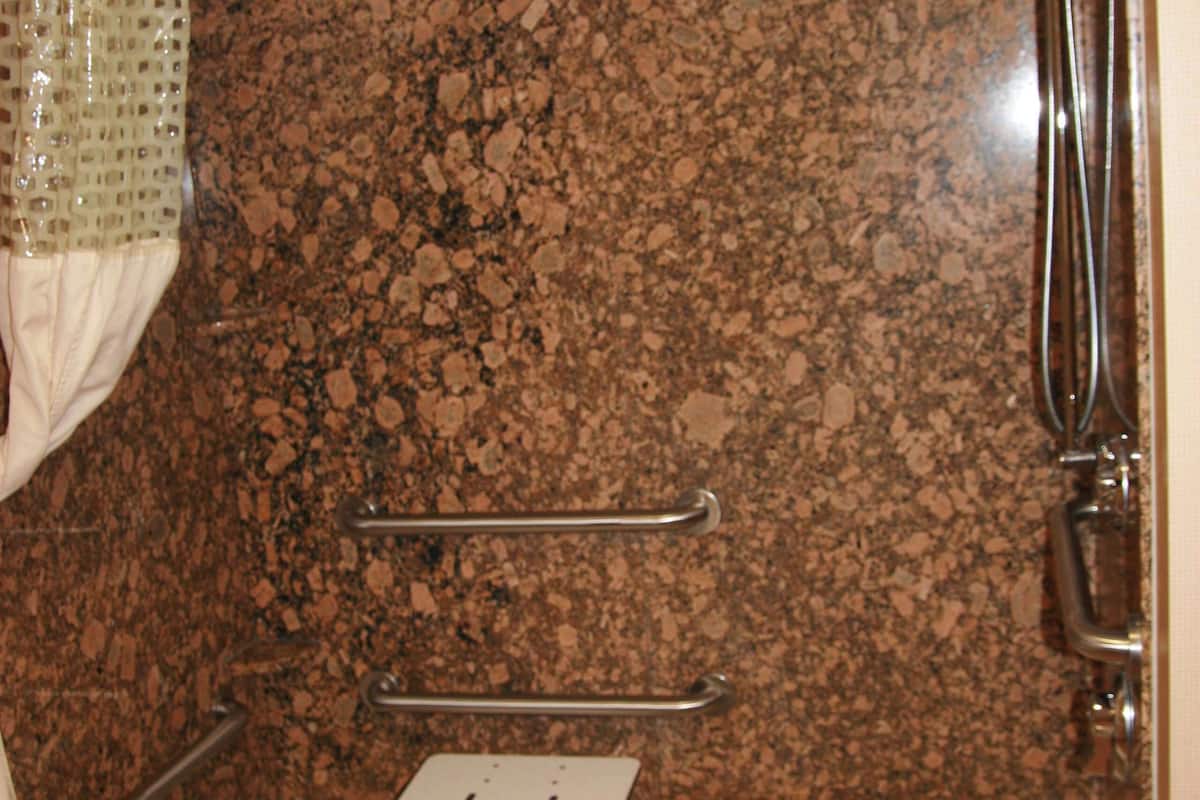 combined shower/bathtub, hair dryer, towels, soap