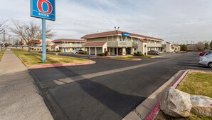 A motel with a '6 Enter' sign, multiple units, and a 'Welcome' sign. - Motel 6 El Paso, TX - East (El Paso)