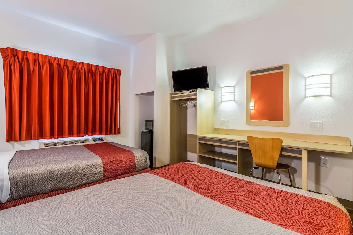 Desk, laptop workspace, free WiFi, bed sheets