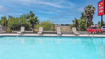 Seasonal outdoor pool, open 9:00 AM to 9:00 PM, sun loungers