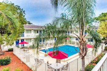 Outdoor pool at Motel 6 Venice, FL