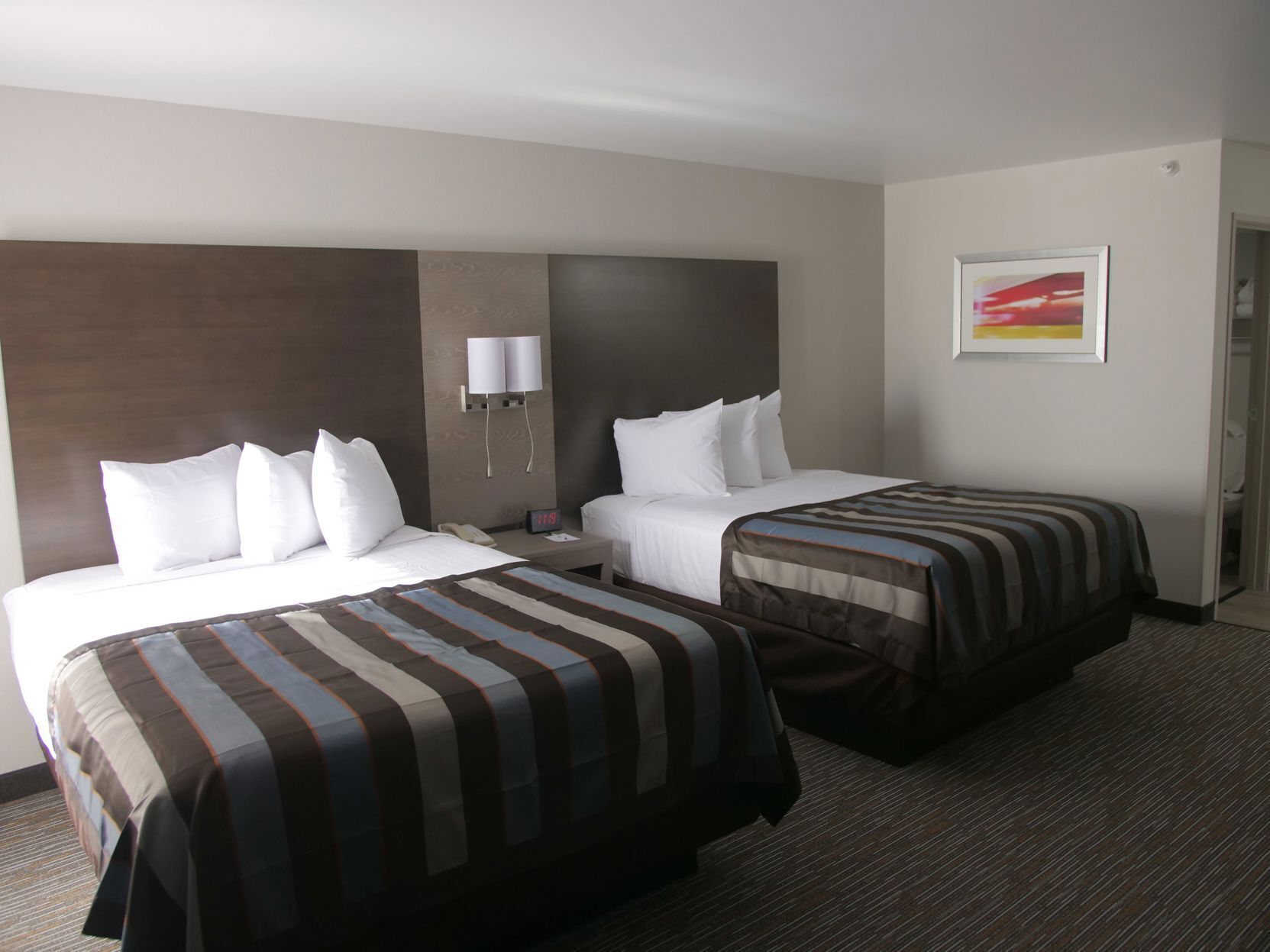 1 bedroom, hypo-allergenic bedding, pillowtop beds, desk