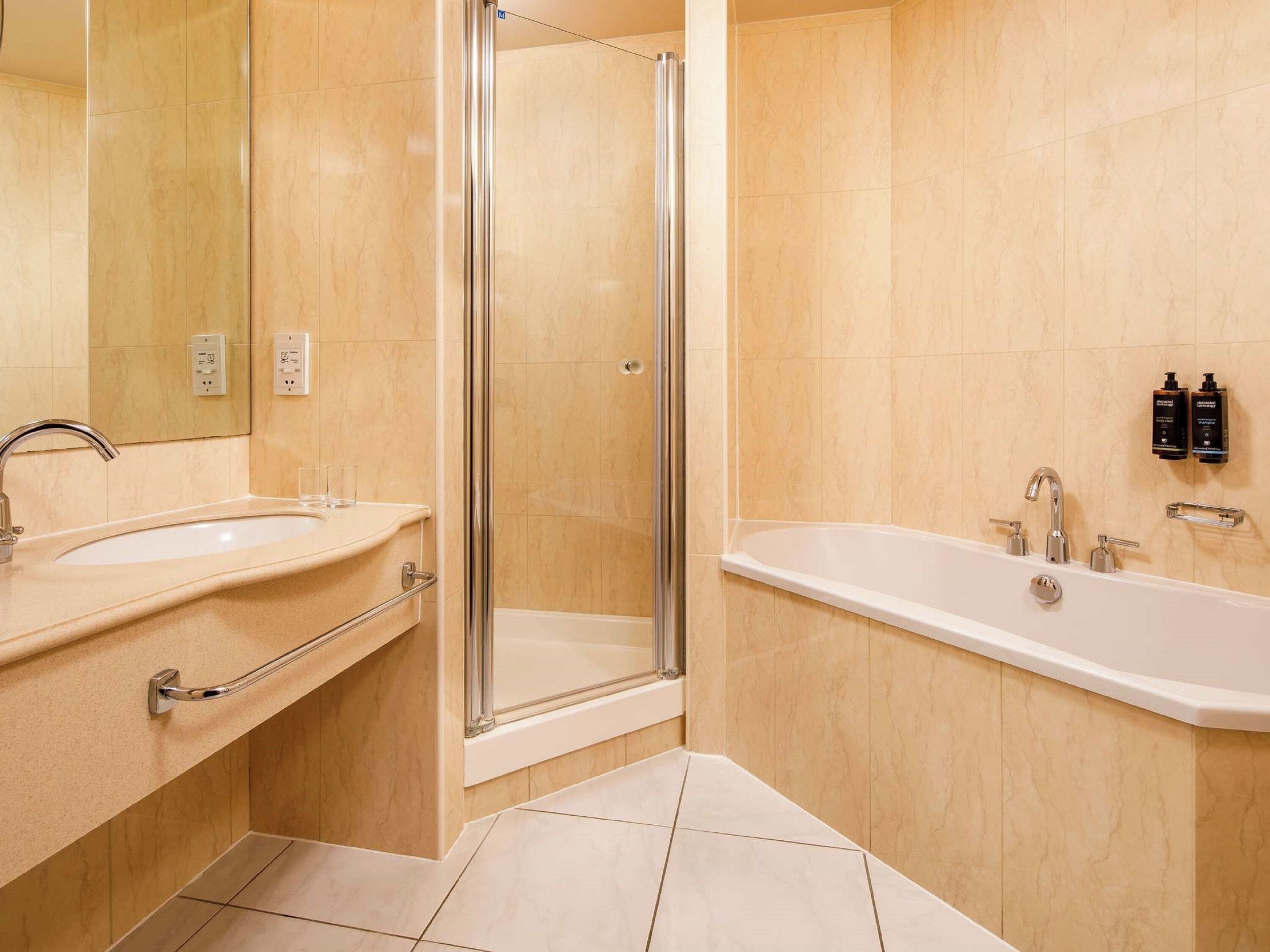 separate bathtub and shower, deep-soaking bathtub