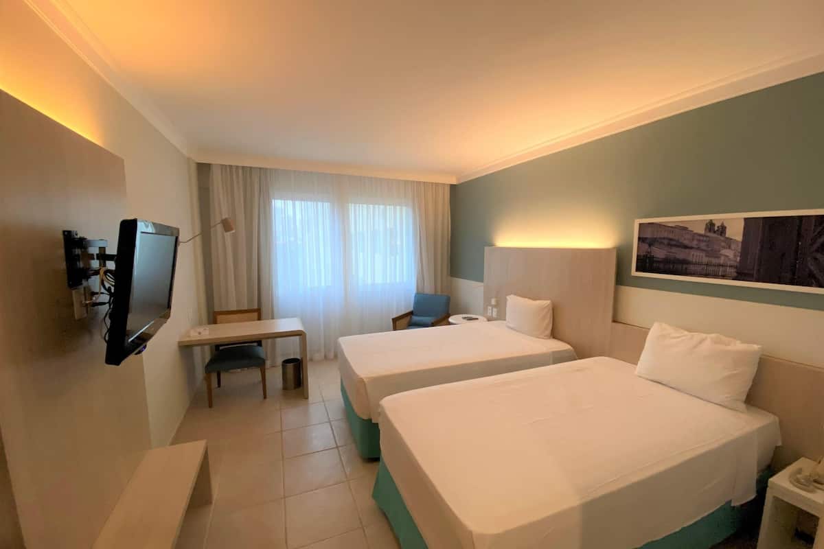 Standard Twin Room, 2 Twin Beds | Minibar, in-room safe, desk, blackout drapes