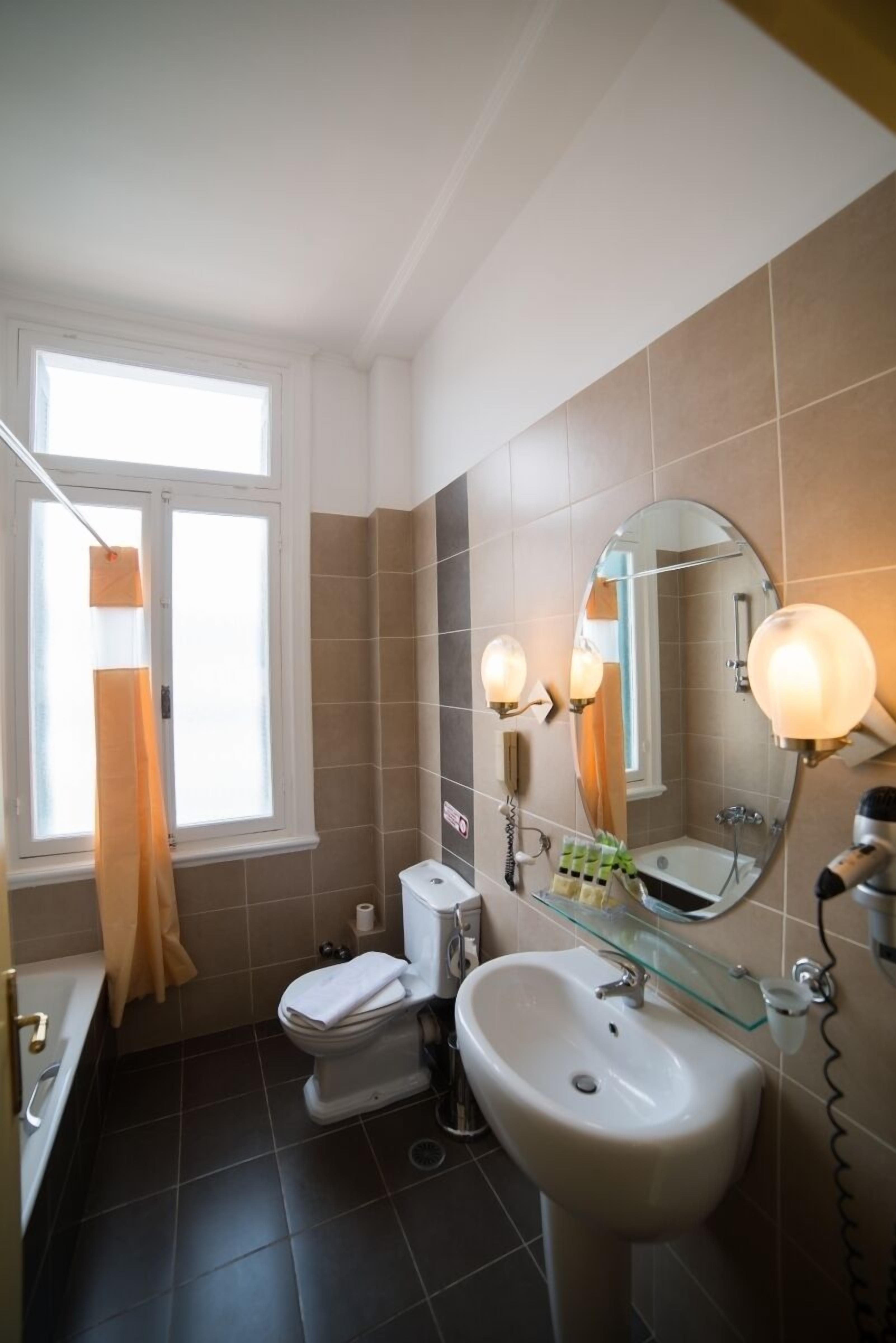 eco-friendly toiletries, hair dryer, towels, soap