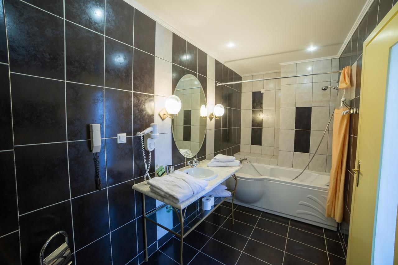 eco-friendly toiletries, hair dryer, towels, soap