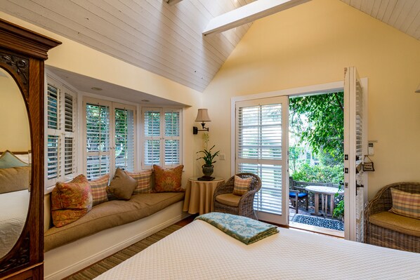 Luxury Bungalow, 1 Queen Bed, Patio, Garden Area (The Garden Room) | Individually decorated, individually furnished, iron/ironing board