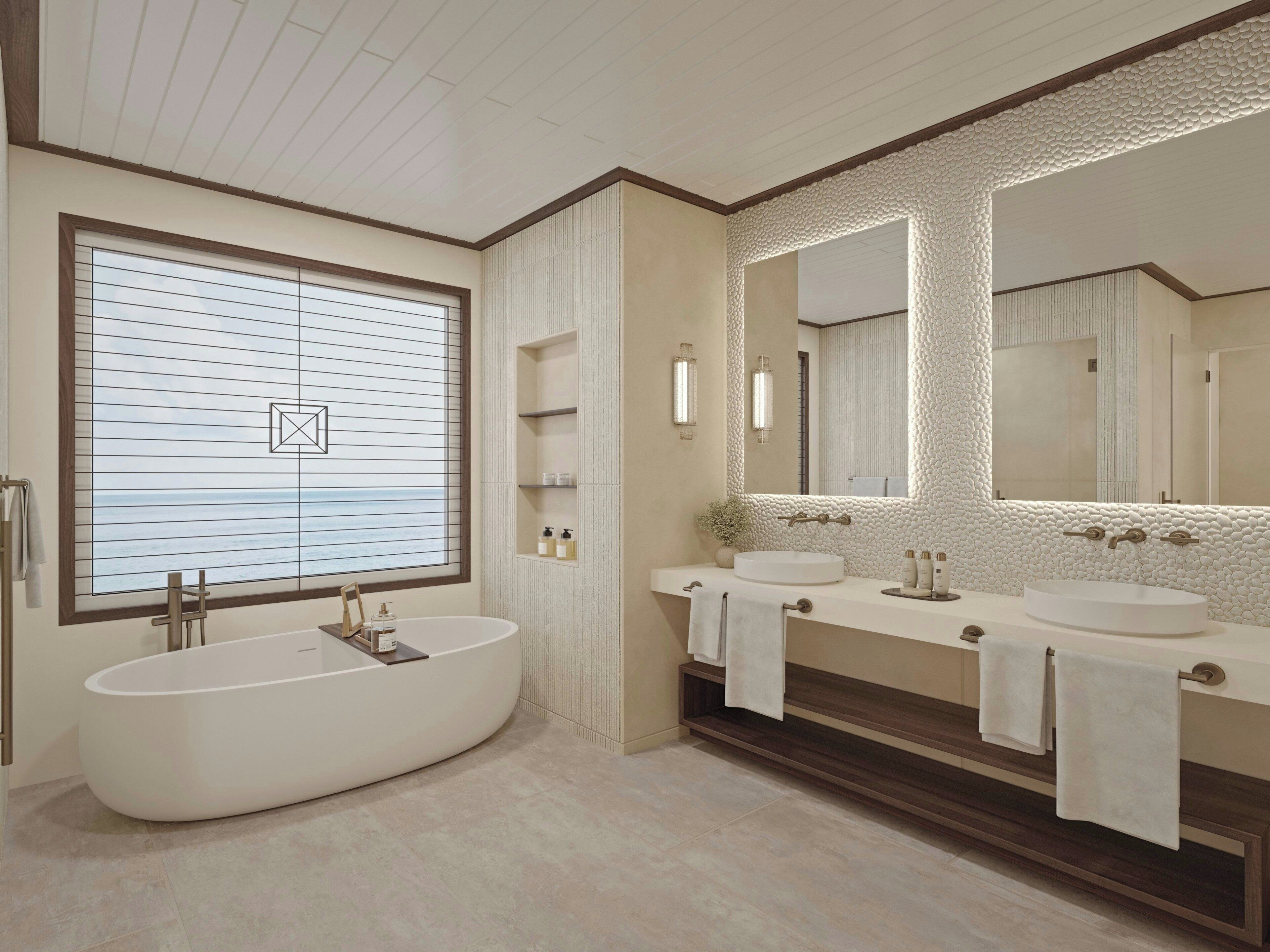 A modern bathroom with a freestanding bathtub, two sinks, and a large mirror.