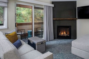 Studio, 1 Queen Bed with Sofa bed, Balcony | Living area | 32-inch LCD TV with cable channels, TV, fireplace