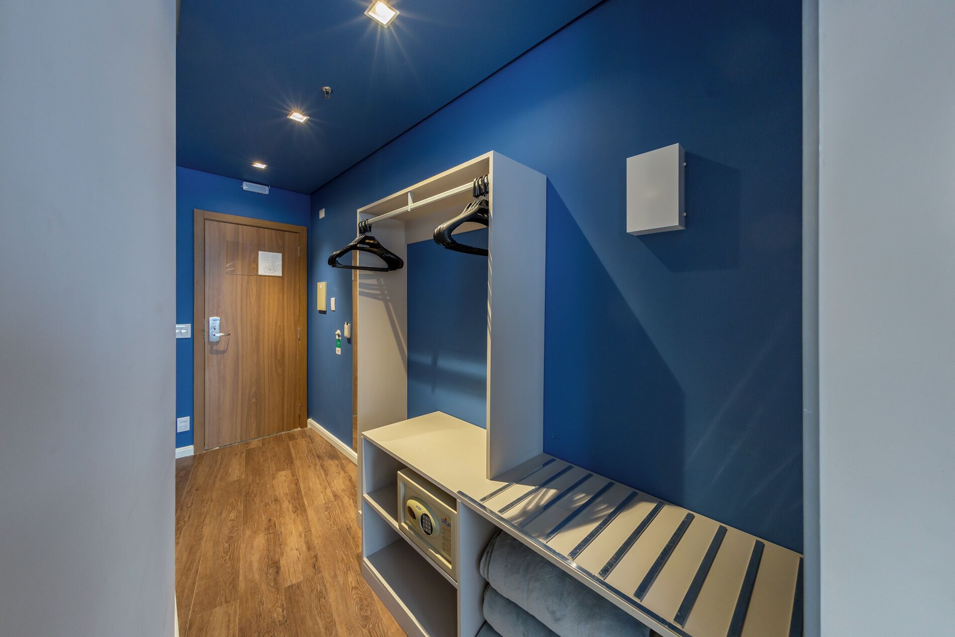 family room | 1 bedroom, minibar, in-room safe, desk